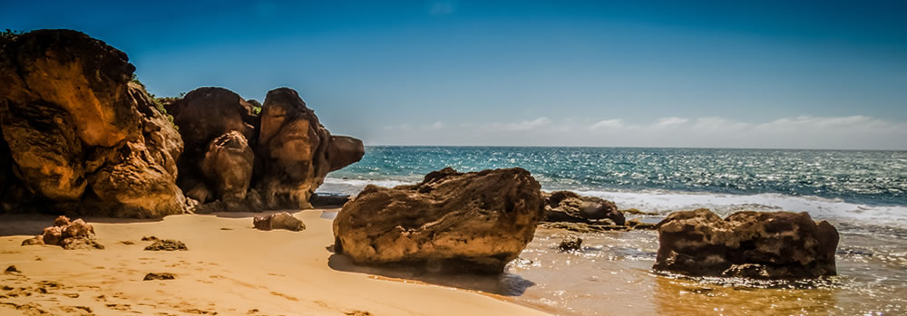 Picture of a beach front with rocks